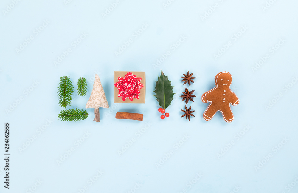 Christmas decorations on pastel color background. Top-down view.