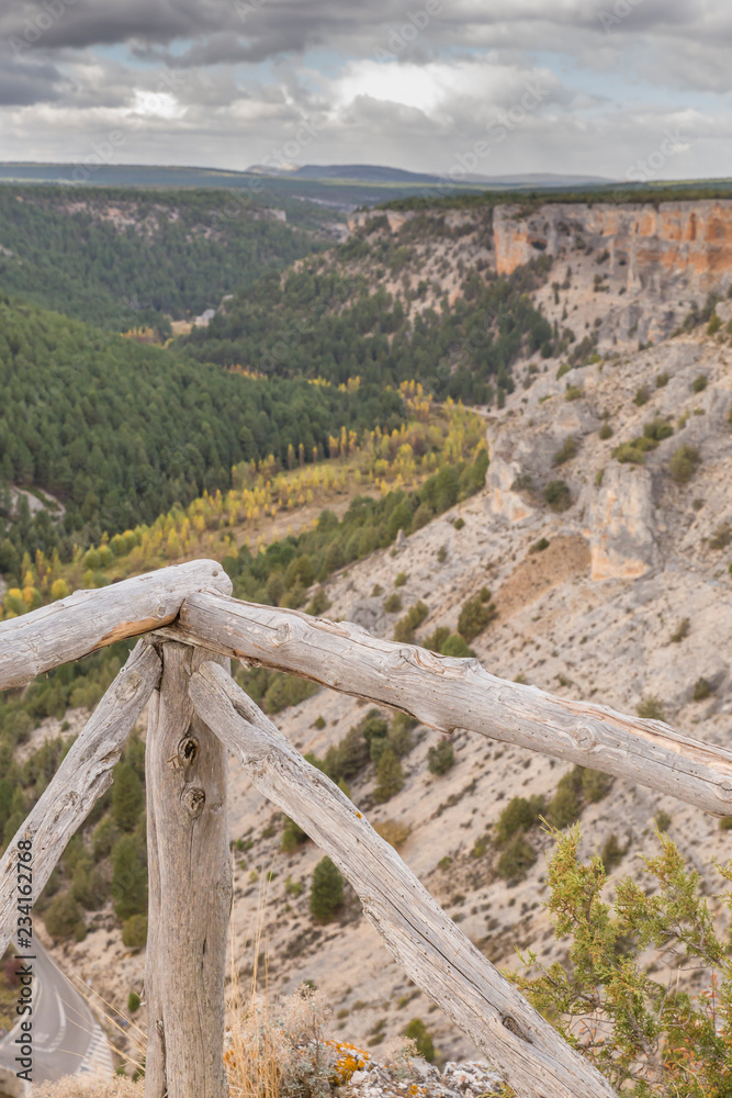 Old wood fence at the top of the Rio Lobos canyon, in Soria, Spain