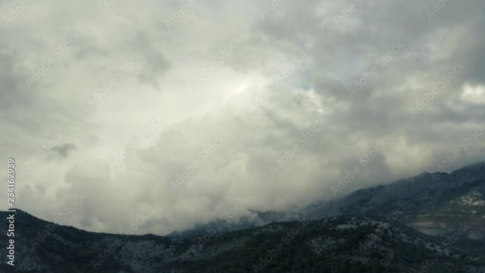 Timelapse - White Cumulus Clouds Swim Over Picturesque Beautiful Mountains In The Autumn Time Timelapse - White Cumulus Clouds Swim Over Picturesque Beautiful Mountains In The Autumn Time