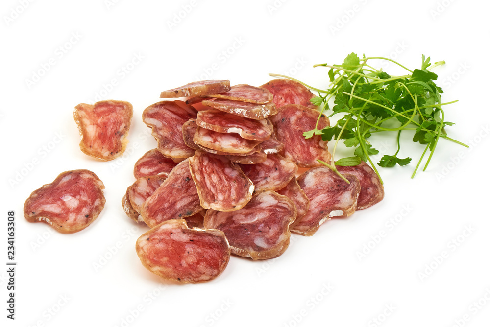 Thin Sliced Jerked Sausage from pork with parsley, isolated on a white background. Close-up Thin Sliced Jerked Sausage from pork with parsley, isolated on a white background. Close-up