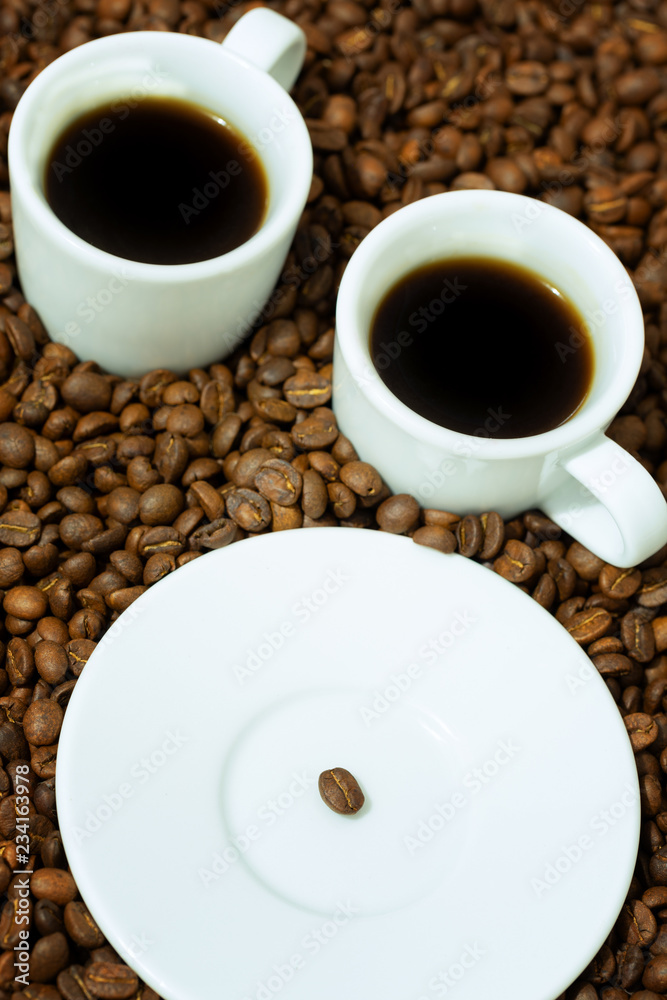 Fototapeta premium a coffee bean on a plate