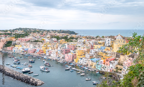 Fototapeta Naklejka Na Ścianę i Meble -  Marina Corricella, colourful fishing village on the island of Procida in the Bay of Naples, Italy. Photo taken from the top of the cliff. 