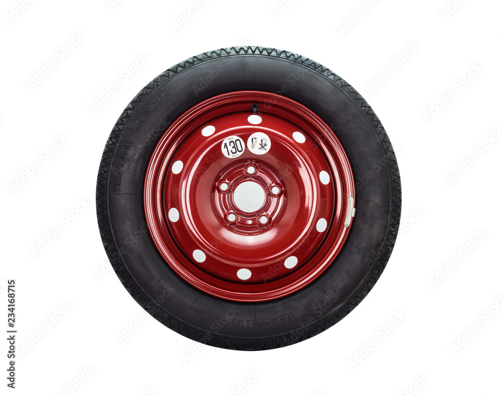 Spare car tire on steel, red rim. Isolated on a white background with a clipping path. Spare car tire on steel, red rim. Isolated on a white background with a clipping path.