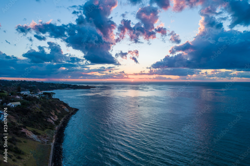 Fototapeta premium Sunset over beautiful ocean coastline in Australia
