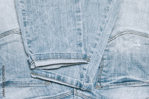 The folded light jeans