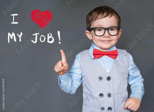 Smart cute kid with glasses says I love my job