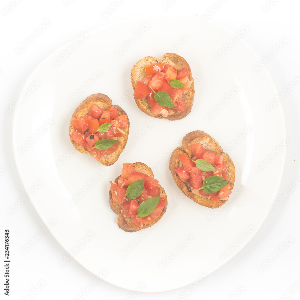 Traditional Italian Bruschetta in a plate Top view Traditional Italian Bruschetta in a plate Top view