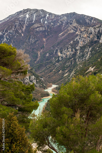 The water of the Verdon River in the Verdon Gorge is a brilliant green color. The canyon in France is one of the most beautiful in Europe