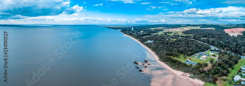 Wide aerial landscape panorama of ocean coastline in Australia photo