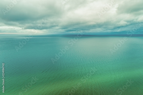 Nothing but clouds over shallow water with copy space - aerial landscape