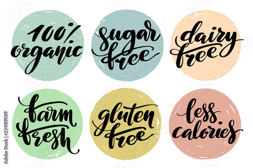 Healthy food label set. Product labels or stickers. Free from gluten, dairy and sugar food label set. 100 percent organic, farm fresh, less calories words by brush on circle backgrounds.