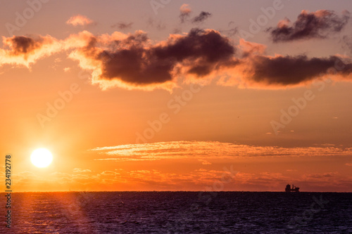 warm coastal sunrise photo