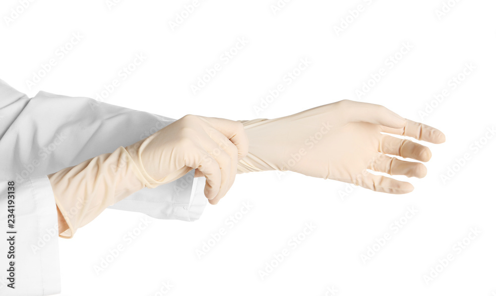 Doctor wearing medical gloves on white background Doctor wearing medical gloves on white background