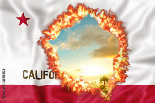 Fires in California in 2018. California Republic Flag on fire with sky sunset background. The fire that is affecting California is considered the most devastating and deadly ever seen in the US state. photo