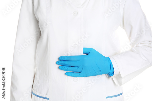 Doctor in uniform with medical glove on white background