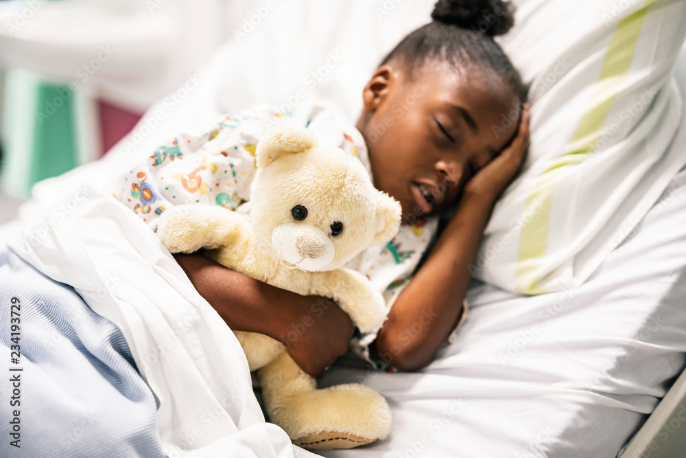 Little girl sleeping in a hospital bed Stock Photo Adobe Stock