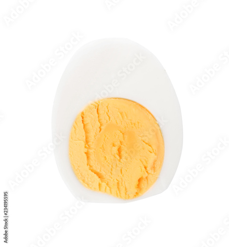 Half of hard boiled egg on white background