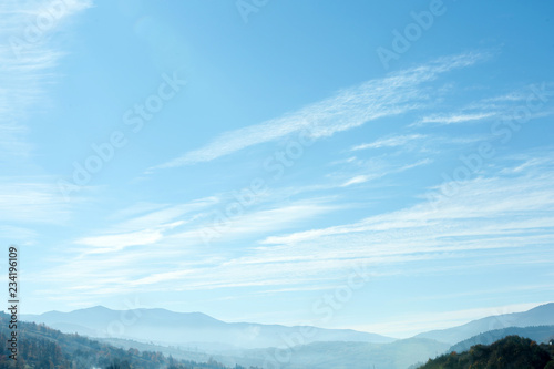 Beautiful landscape with blue sky over mountain slopes © New Africa