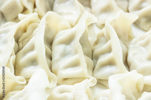 close up of steamed gyoza or pork dumplings