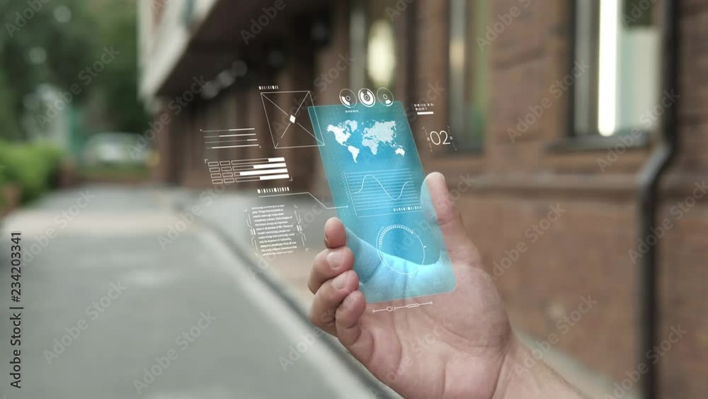 Handsome man using smartphone with futuristic screen. Businessman in the city use new transparent smart phone. World map. Multimedia technology. Future is now. Blue screen