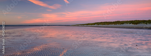 Autumn sunset over the Solent from West Wittering Beach, West Sussex. UK
