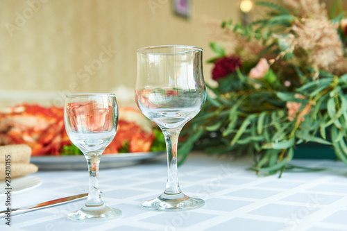 Close up picture of empty wine glasses in restaurant.