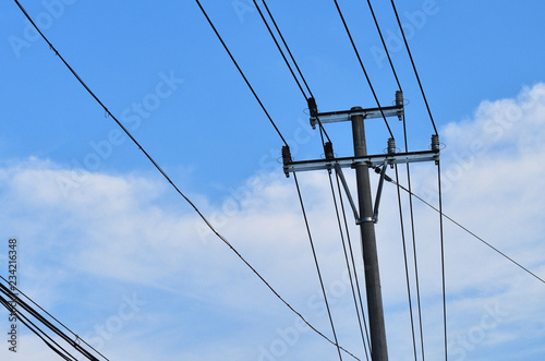 power lines on background of blue sky