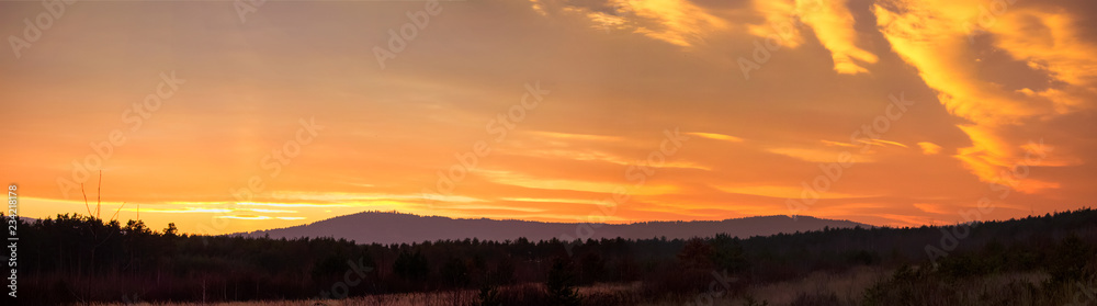 Panormatic view to sunset in mountain with forest, Czech landscape