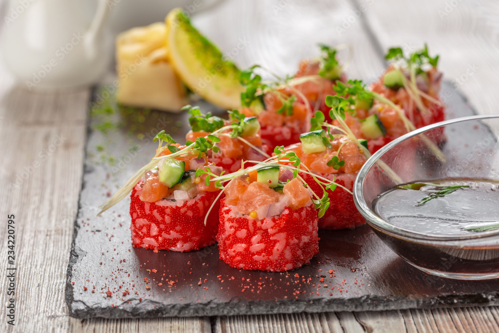 fresh sushi on rustic wooden table fresh sushi on rustic wooden table