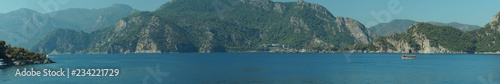 Mountain and the sea panorama. landscape background © maxkolmeto