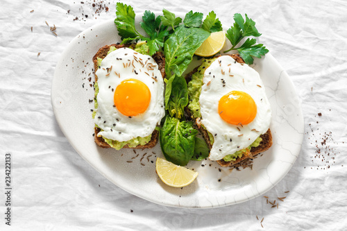 Top view healthy avocado toasts breakfast lunch avocado toast fried eggs white background