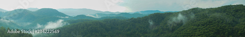 Mountain panorama with a dramatic sky background