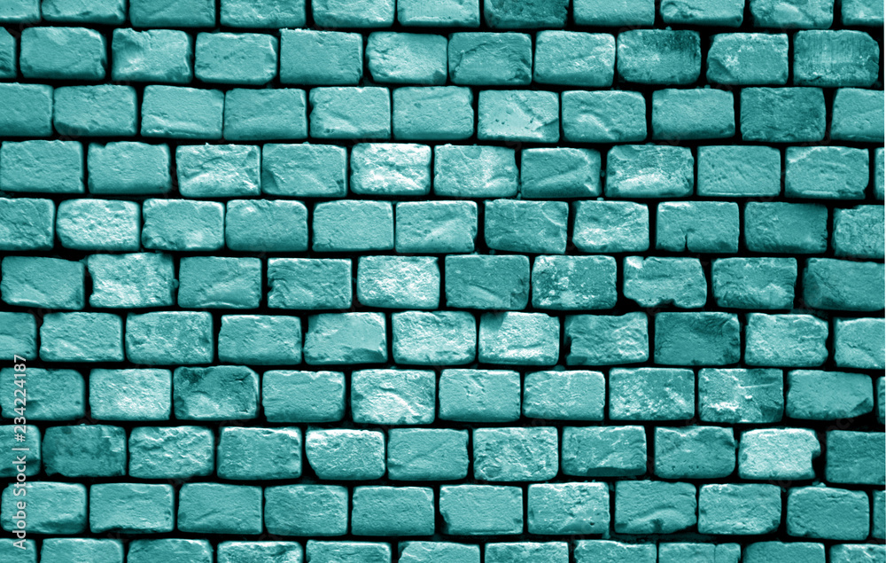 Old grungy brick wall surface in cyan tone. Old grungy brick wall surface in cyan tone.
