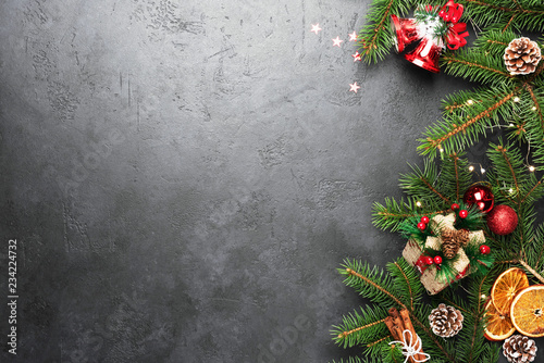 Christmas Background Fir Tree Decorations On Black Concrete With Copy Space