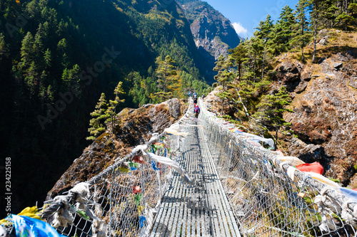 Принти на полотні Suspension bridge over the river in Himalaya mountains, Nepal.