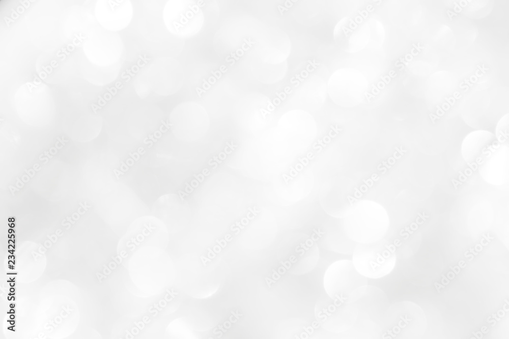 A brilliant white background with circles and ovals. Template for a holiday card with bright and sparkling lights.