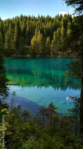 Fototapeta Naklejka Na Ścianę i Meble -  Lago di Carezza (Karersee), a Beautiful Lake in the Dolomites, Trentino Alto Adige, Italy.