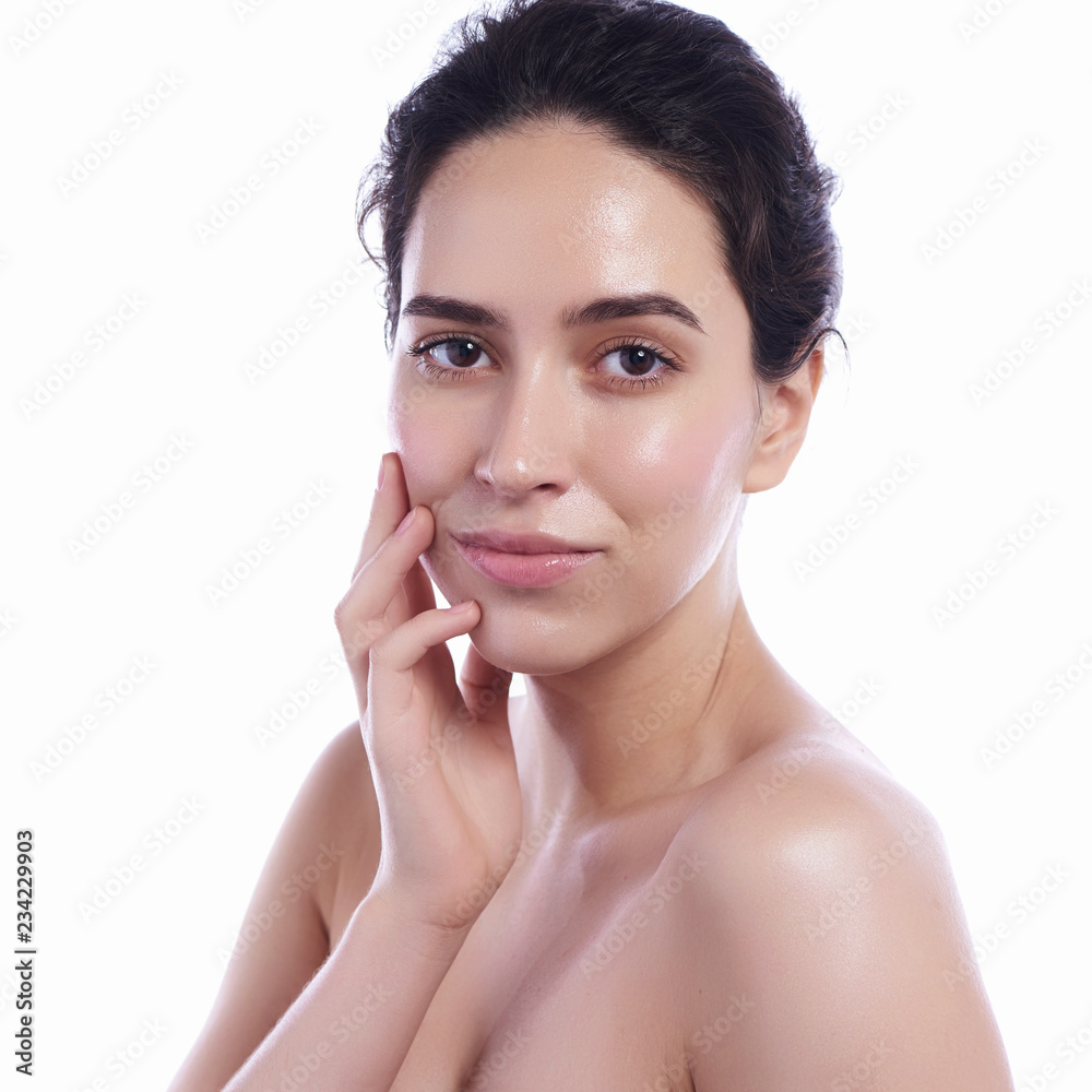 Beauty Woman face Portrait. Beautiful Spa model Girl with Perfect Fresh Clean Skin. Female looking at camera and smiling.