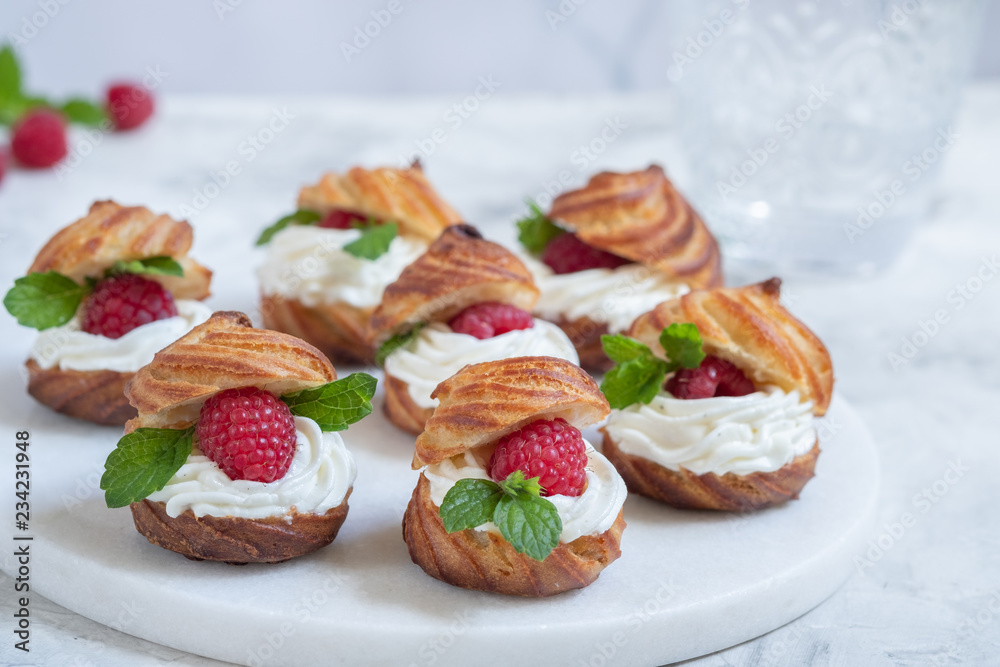 Raspberries Profiteroles with White Chocolate cream Raspberries Profiteroles with White Chocolate cream