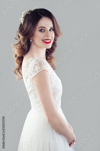 Happy bride woman in white wedding dress. Woman smiling