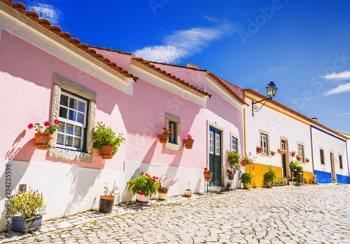 Beautiful colorful street in Obidos, Portugal photo