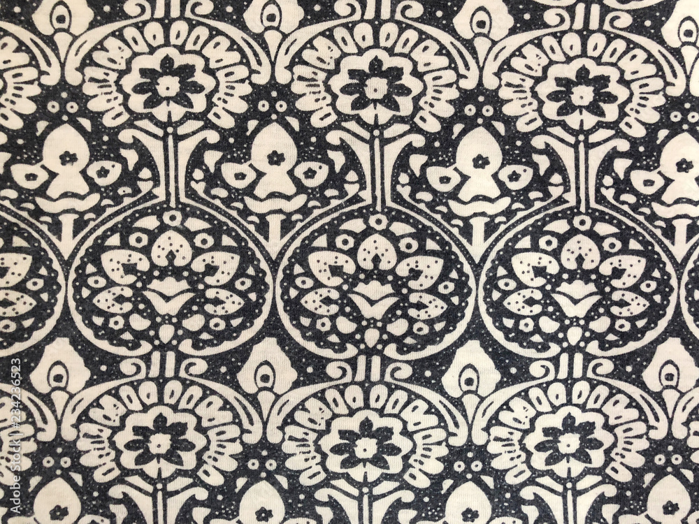 vintage flower pattern in dark blue color, flora pattern screen on cloth, background of flower pattern, Oriental pattern style background