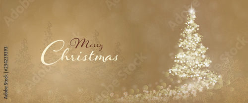 Christmas time. Christmas tree with stars and snowflakes in golden winter landscape. Text : Merry Christmas