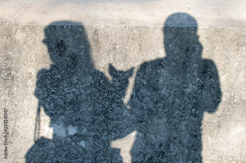 Couple creates a shadow on the wall