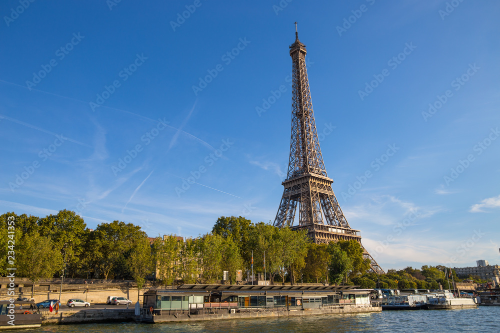 Fototapeta PARIS, FRANCE, SEPTEMBER 8, 2018 - The Eiffel Tower from the river Seine in a sunny day in Paris, France