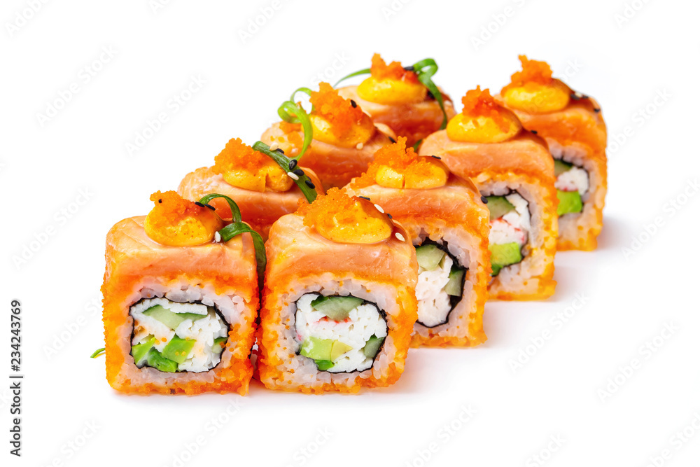 Closeup image of sushi rolls with salmon, cream cheese, cucumber and avocado isolated at white background. Closeup image of sushi rolls with salmon, cream cheese, cucumber and avocado isolated at white background.