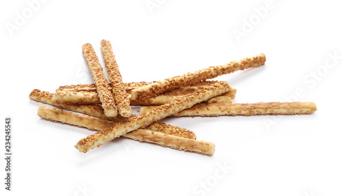 Cracker pretzel bread sticks with sesame isolated on white background