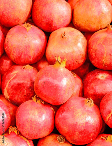 vibrant red pomegranate fruits top view