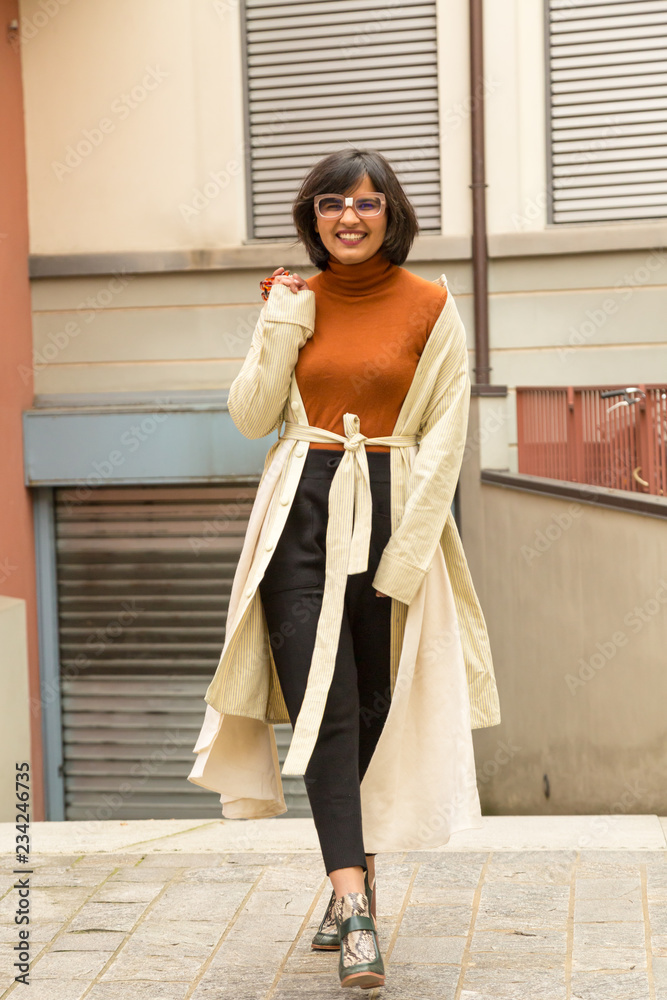 Indian woman posing in an urban context Indian woman posing in an urban context