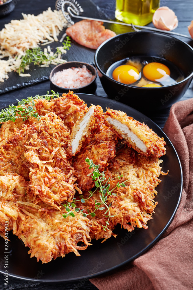 meat chops coated with grated potato and cheese meat chops coated with grated potato and cheese